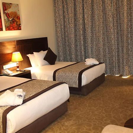 איסמעליה Tolip El Forsan Hotel מראה חיצוני תמונה A room at the hotel