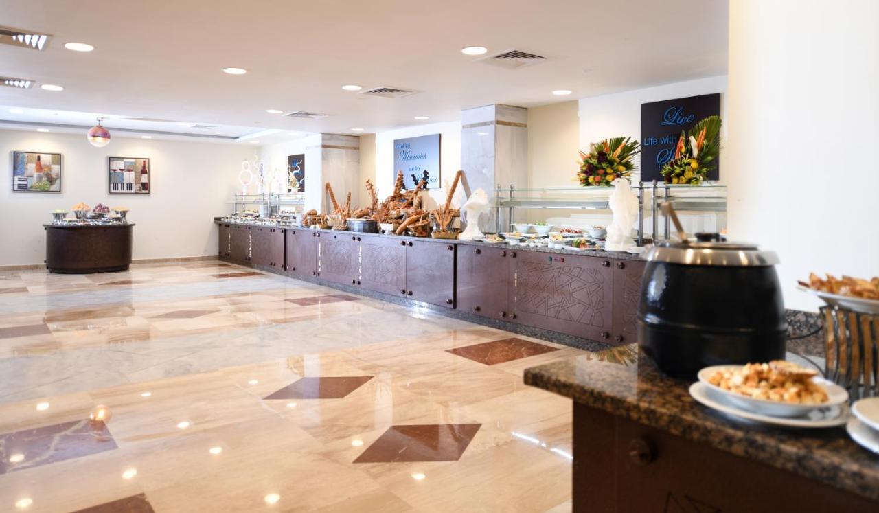 איסמעליה Tolip El Forsan Hotel מראה חיצוני תמונה The buffet at the hotel