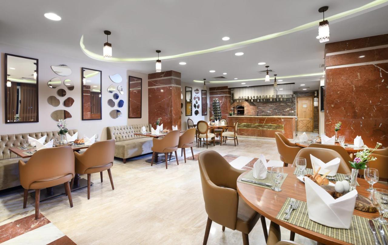 איסמעליה Tolip El Forsan Hotel מראה חיצוני תמונה The restaurant