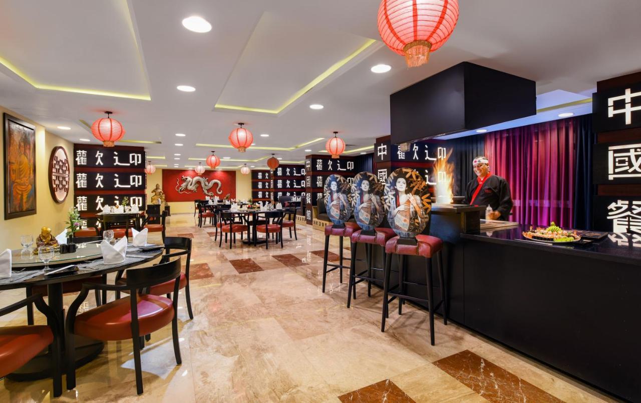 איסמעליה Tolip El Forsan Hotel מראה חיצוני תמונה The interior of the restaurant