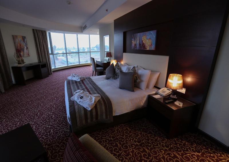 איסמעליה Tolip El Forsan Hotel מראה חיצוני תמונה A bedroom at the hotel