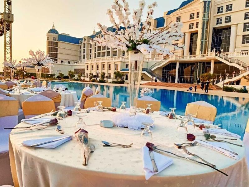 איסמעליה Tolip El Forsan Hotel מראה חיצוני תמונה Wedding reception at the poolside